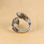 Adjustable silver-tone feather ring
