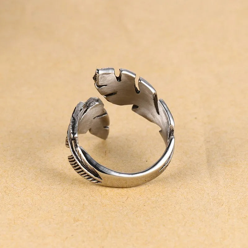 Adjustable silver-tone feather ring
