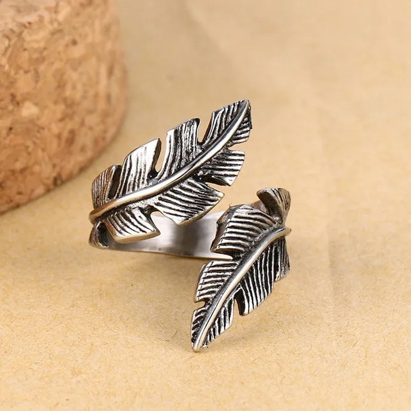 Adjustable silver-tone feather ring