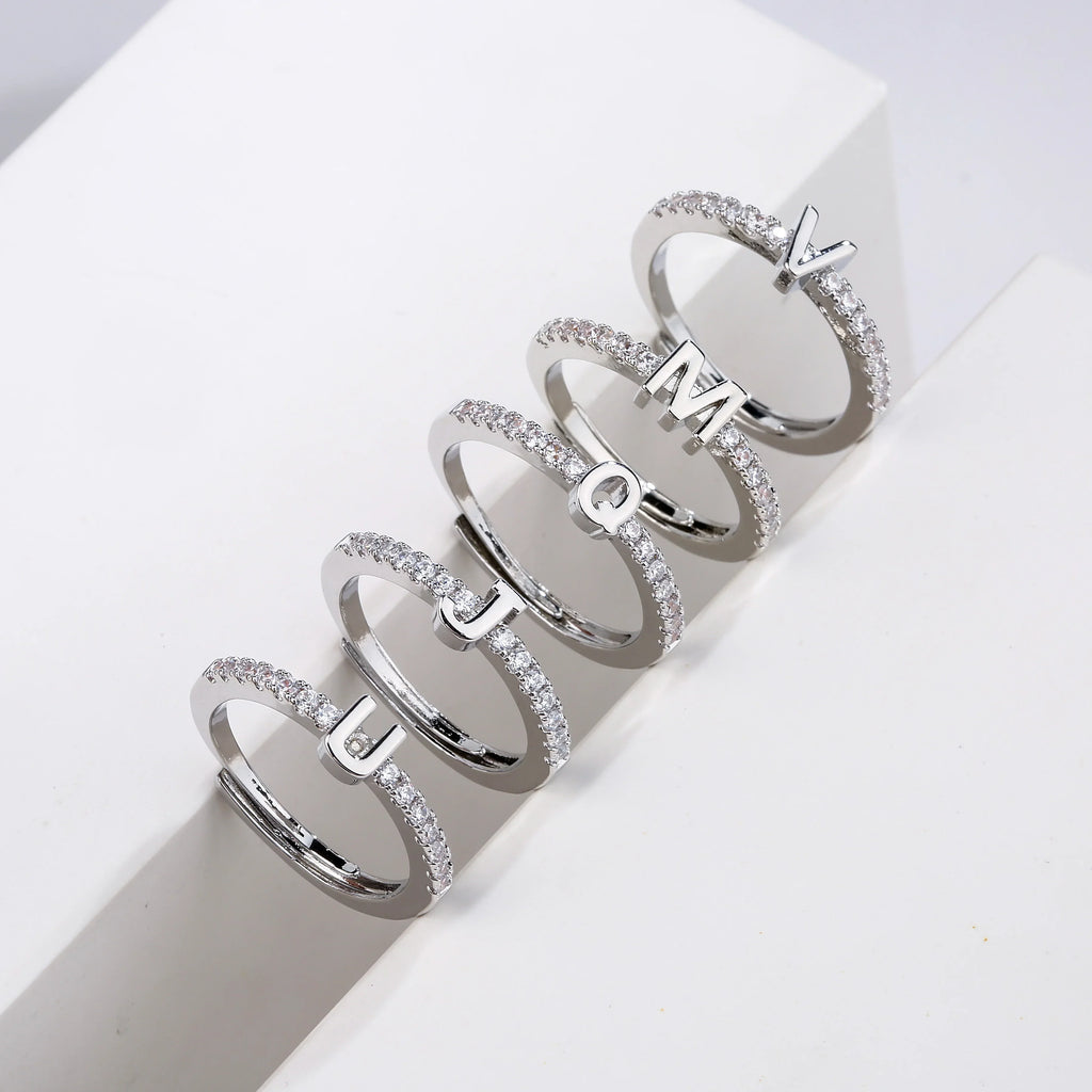 Adjustable women's ring with initial letter