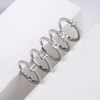 Adjustable women's ring with initial letter