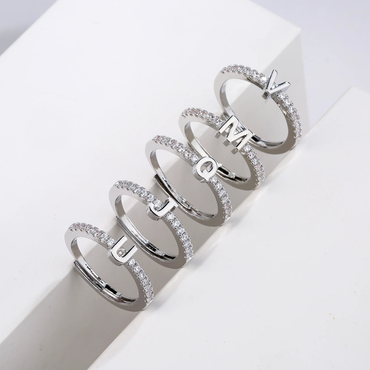 Adjustable women's ring with initial letter