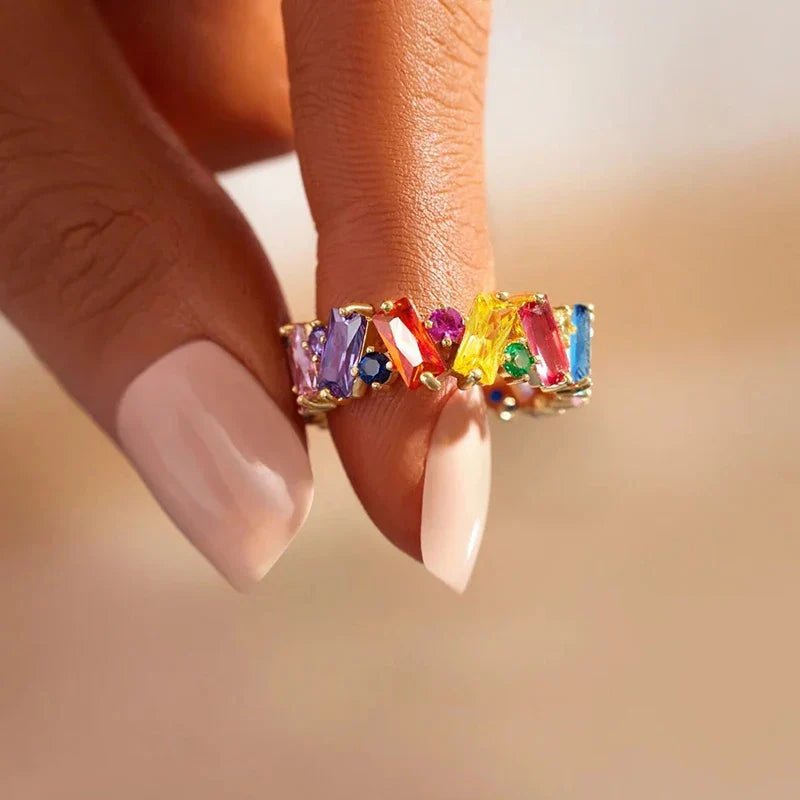 Geometric rainbow ring in gold