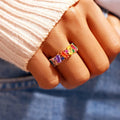 Geometric rainbow ring in gold