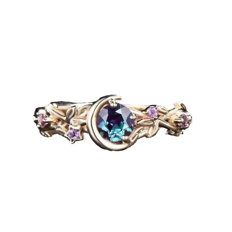 Ring with Gold Crescent Moon and Zircon