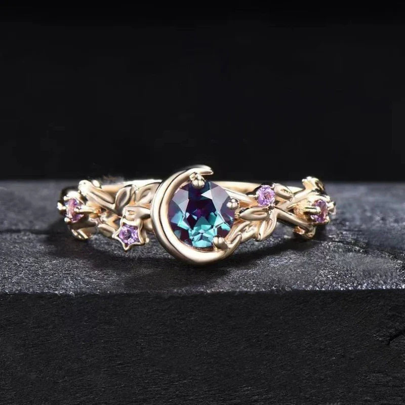 Ring with Gold Crescent Moon and Zircon
