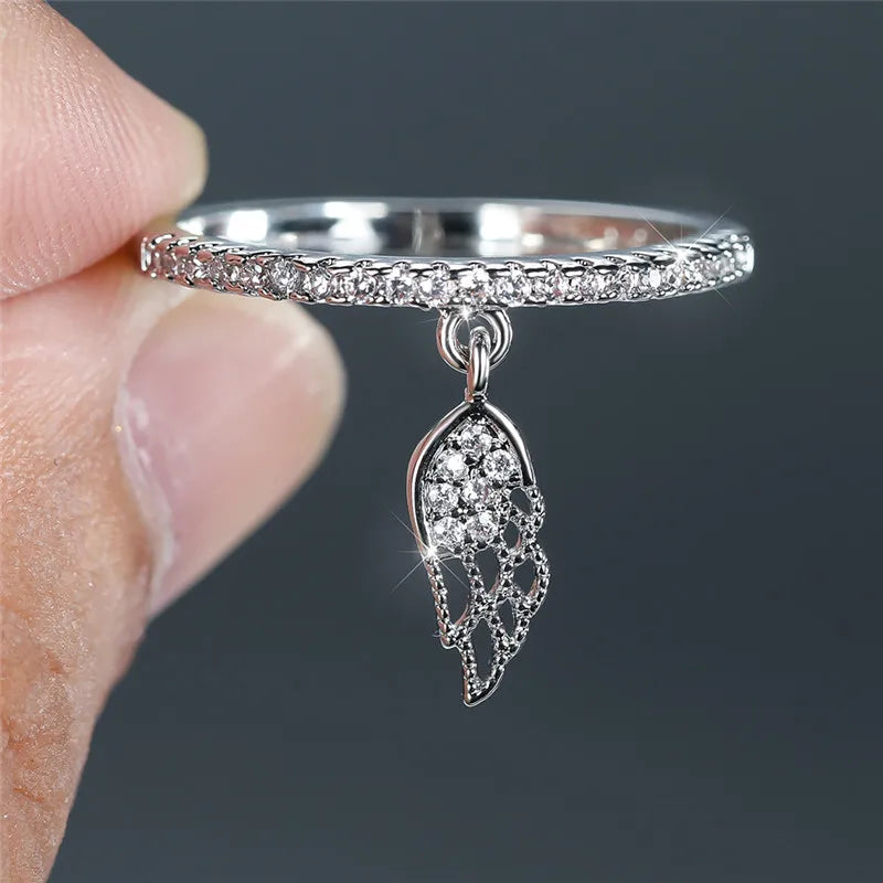 Ring with angel wing pendant silver
