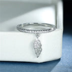 Ring with angel wing pendant silver