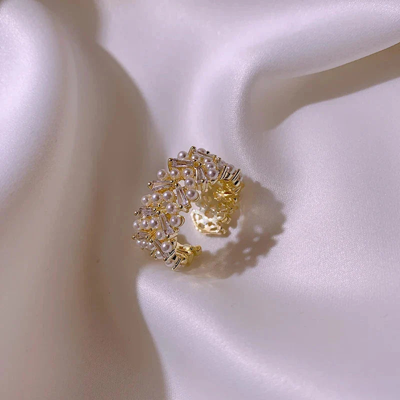 Ring with White Zircon Pearls