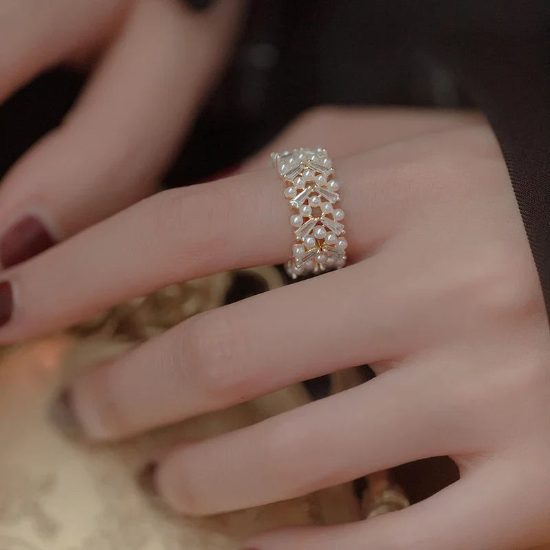 Ring with White Zircon Pearls