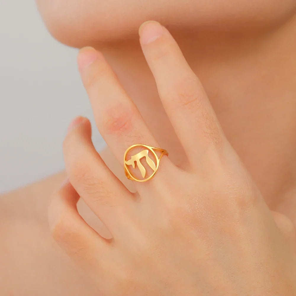 Hollow ring with the Jewish life symbol Chai in gold
