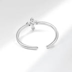 Elegant Ring with Zircon Cross