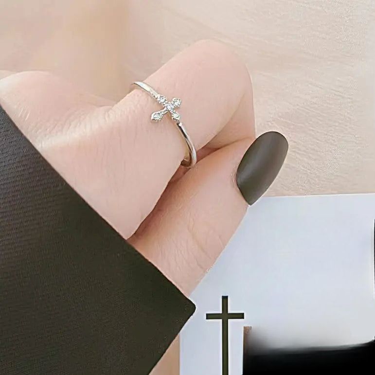 Elegant Ring with Zircon Cross