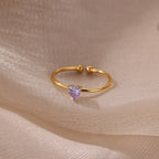 Delicate gold-plated ring with heart-shaped birthstone