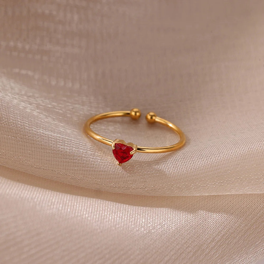 Delicate gold-plated ring with heart-shaped birthstone