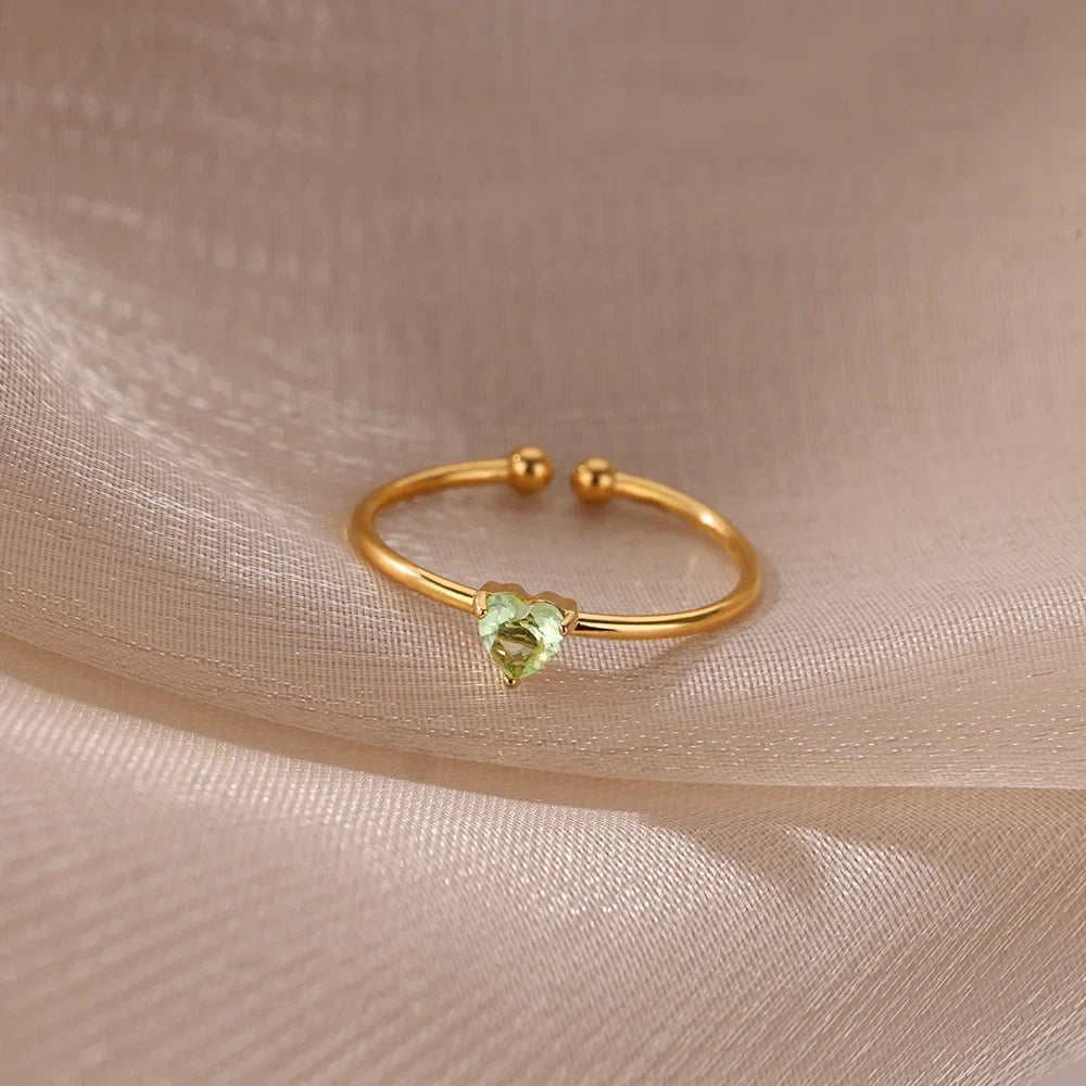 Delicate gold-plated ring with heart-shaped birthstone