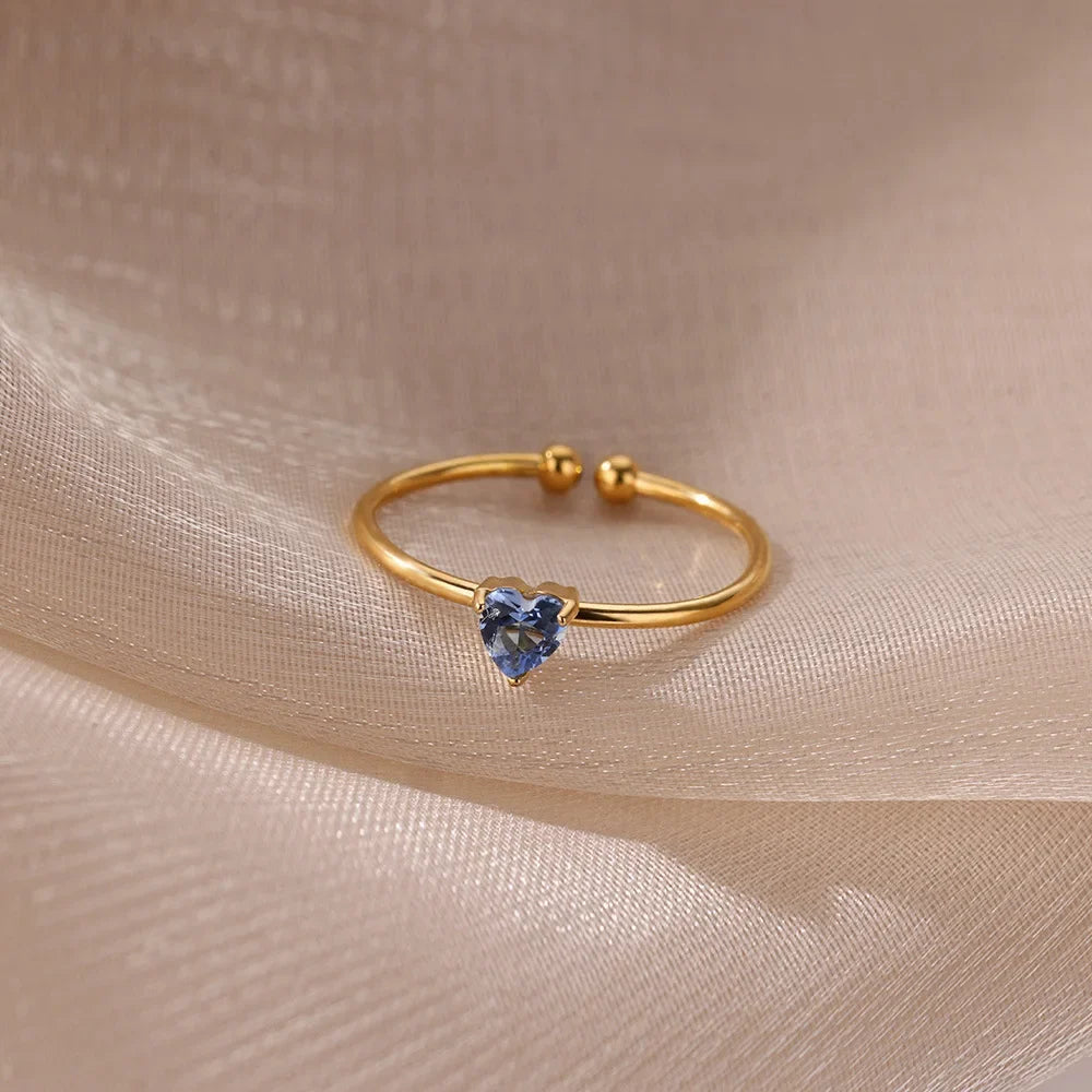 Delicate gold-plated ring with heart-shaped birthstone