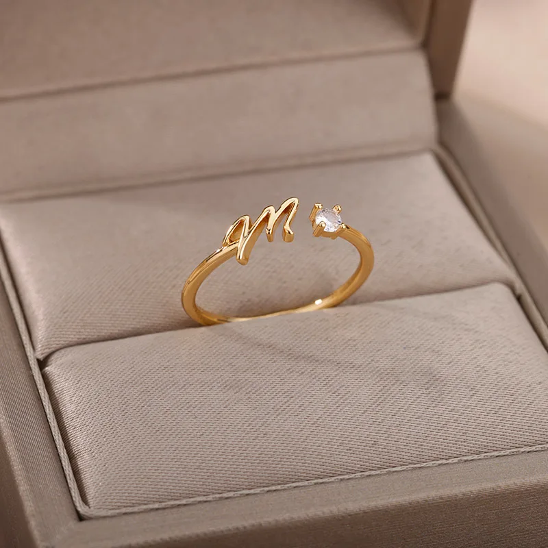 Thin women's ring with initial - letter M