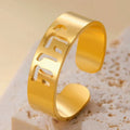 Wide ring with Hebrew engraving in gold