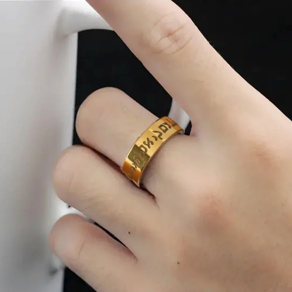 Wide ring with Hebrew letters in gold