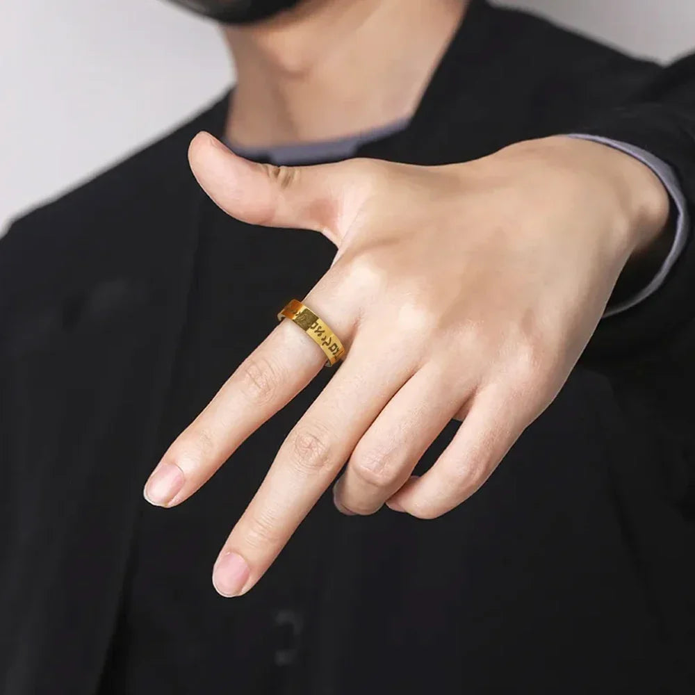 Wide ring with Hebrew letters in gold
