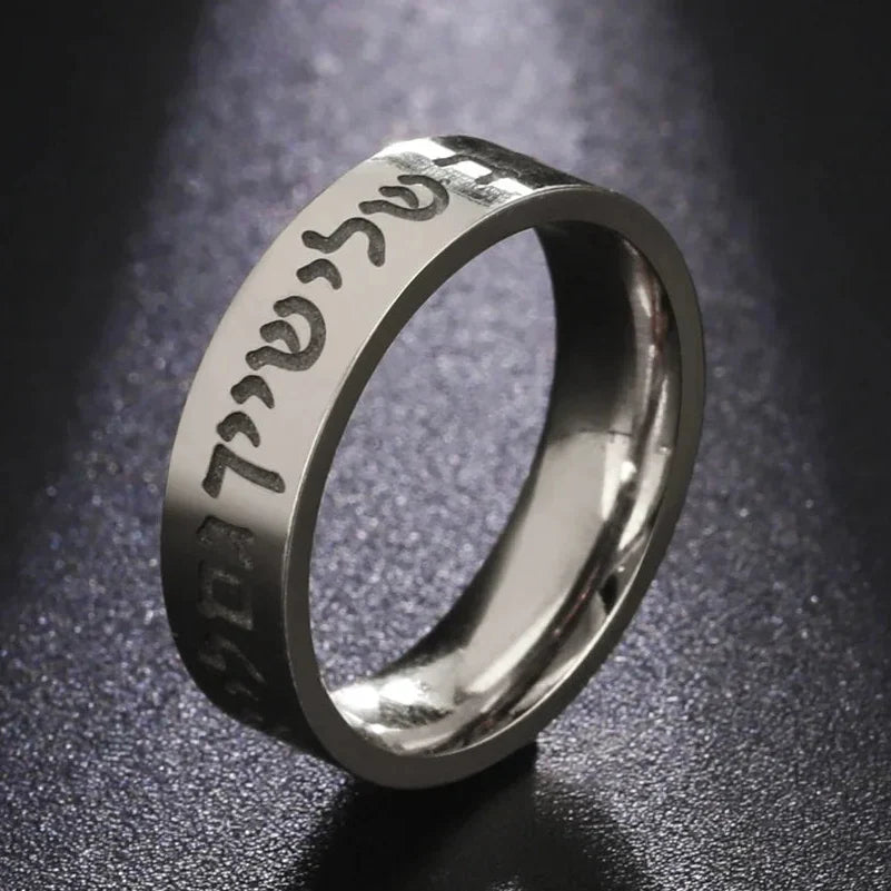Wide ring with Hebrew letters in silver