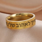 Wide ring with Hebrew letters in gold