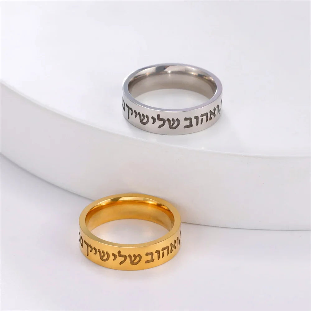 Wide ring with Hebrew letters in gold