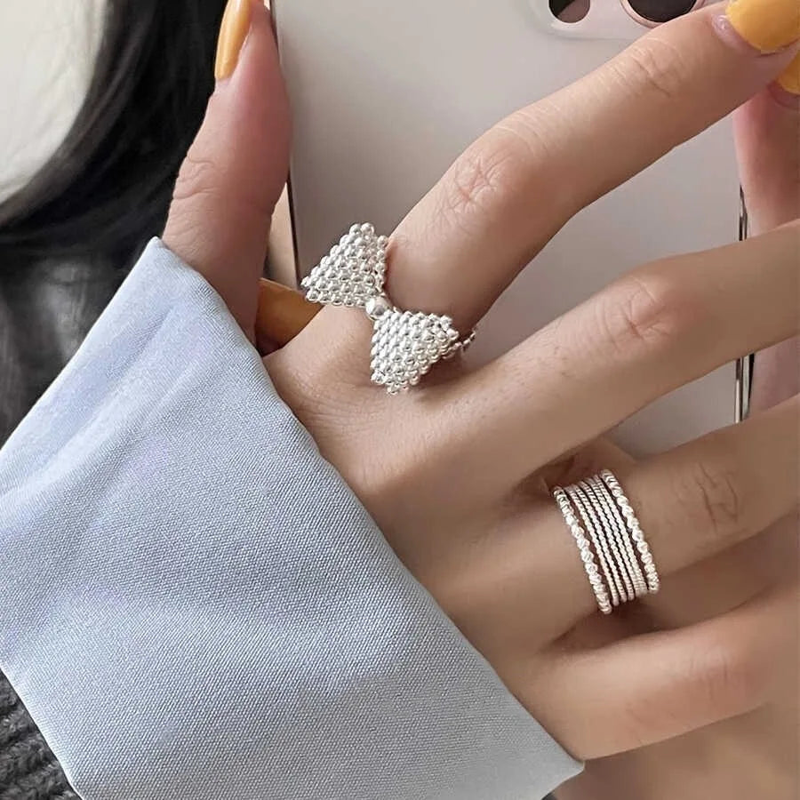 Bow tie and pearl ring