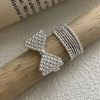 Bow tie and pearl ring