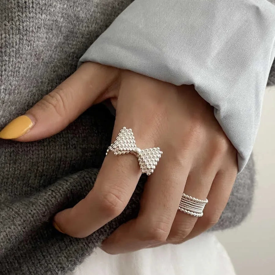Bow tie and pearl ring