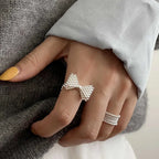 Bow tie and pearl ring