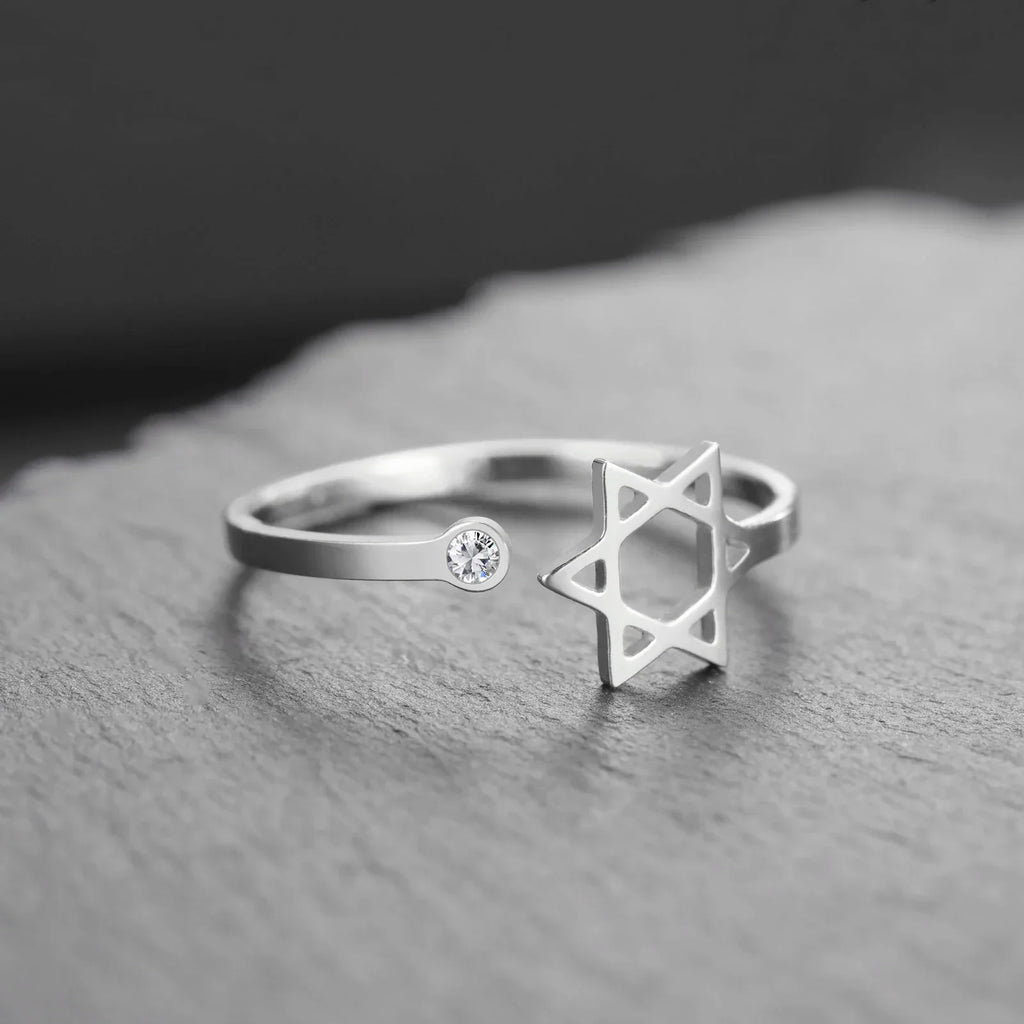 Open ring with a symbolic Jewish Star of David in silver
