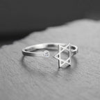 Open ring with a symbolic Jewish Star of David in silver