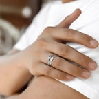 Open feather-shaped ring