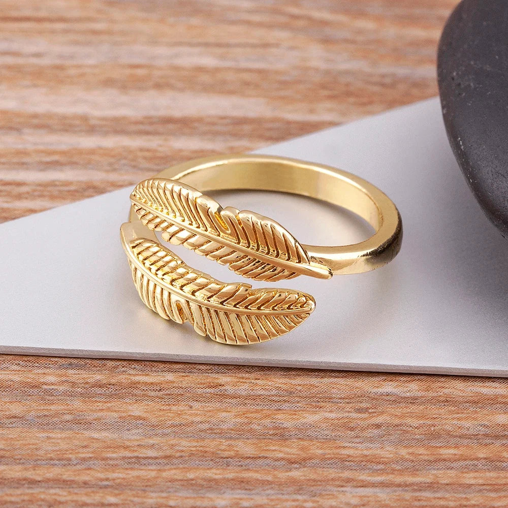Gold-tone engraved feather ring