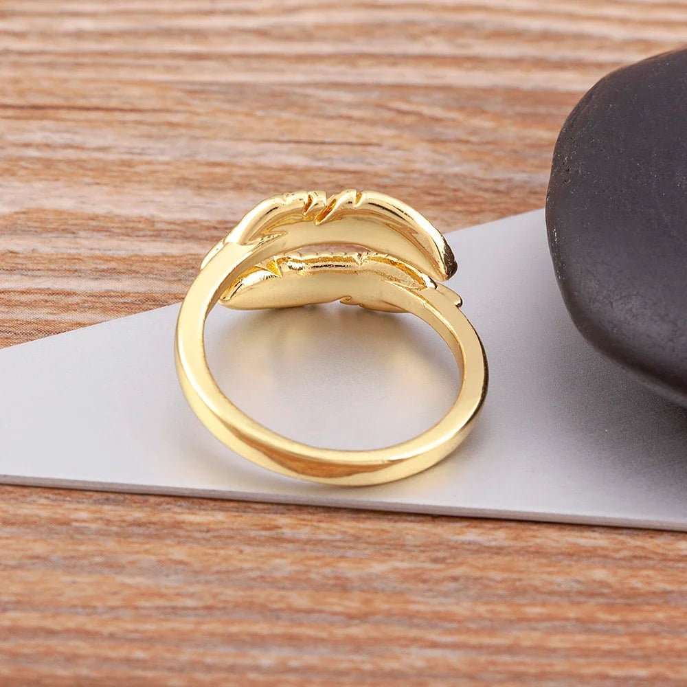 Gold-tone engraved feather ring