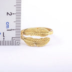 Gold-tone engraved feather ring