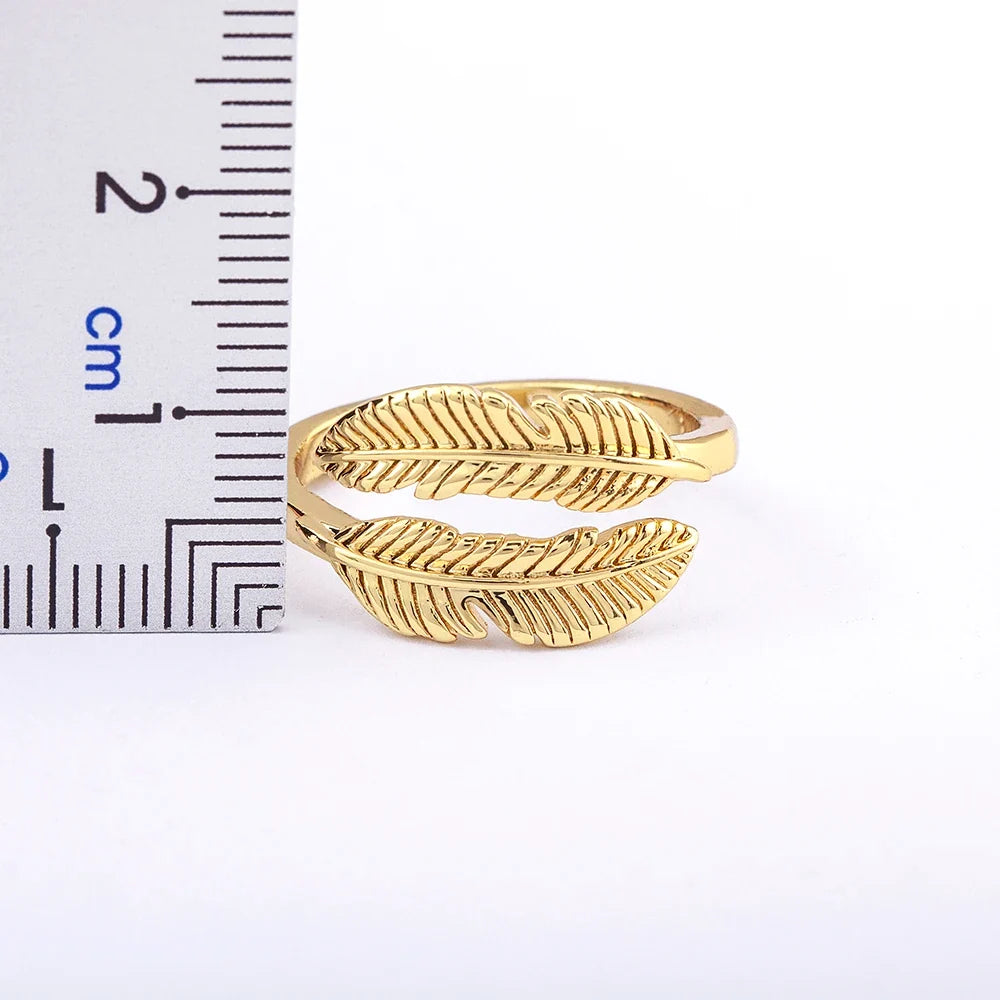 Gold-tone engraved feather ring