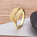 Gold-tone engraved feather ring