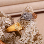 Signet ring with engraved spiral motif in silver