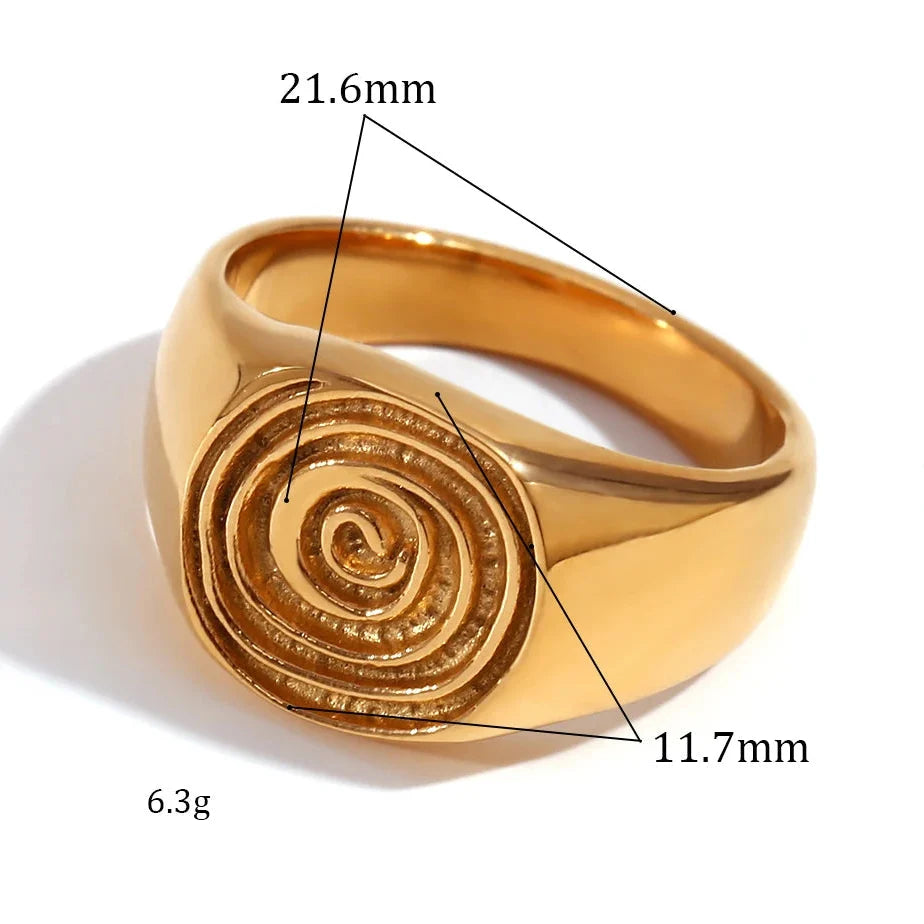 Signet ring with engraved spiral motif