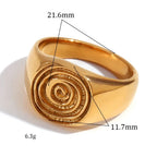 Signet ring with engraved spiral motif