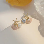 Asymmetrical pink shell earrings