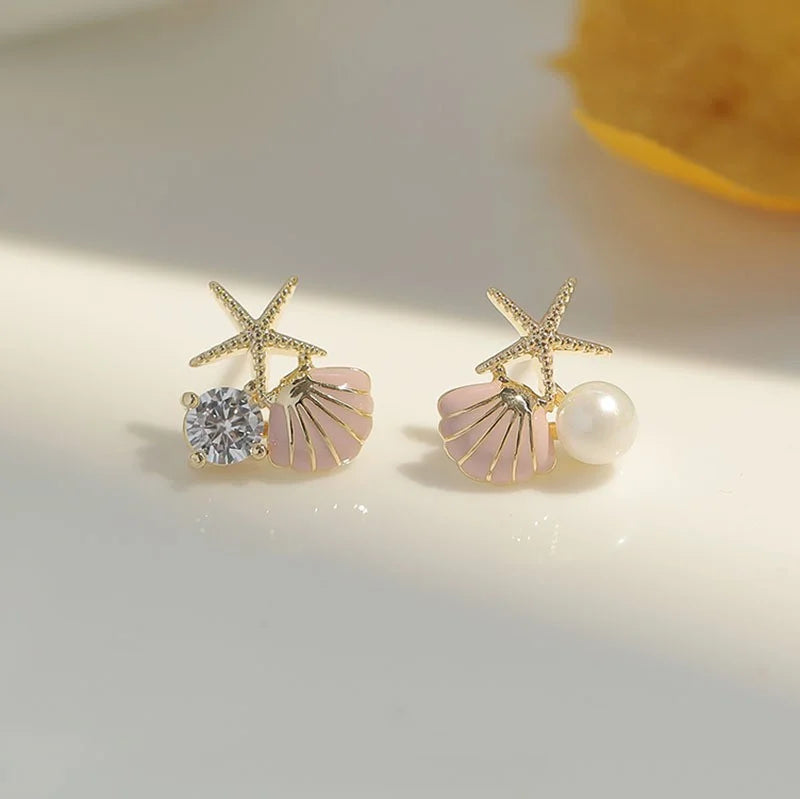 Asymmetrical pink shell earrings