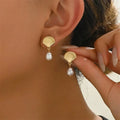 Gold-tone shell and pearl earrings