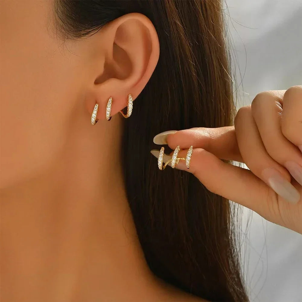 Elegant earrings with three-prong rhinestones