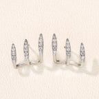 Elegant earrings with three-prong rhinestones