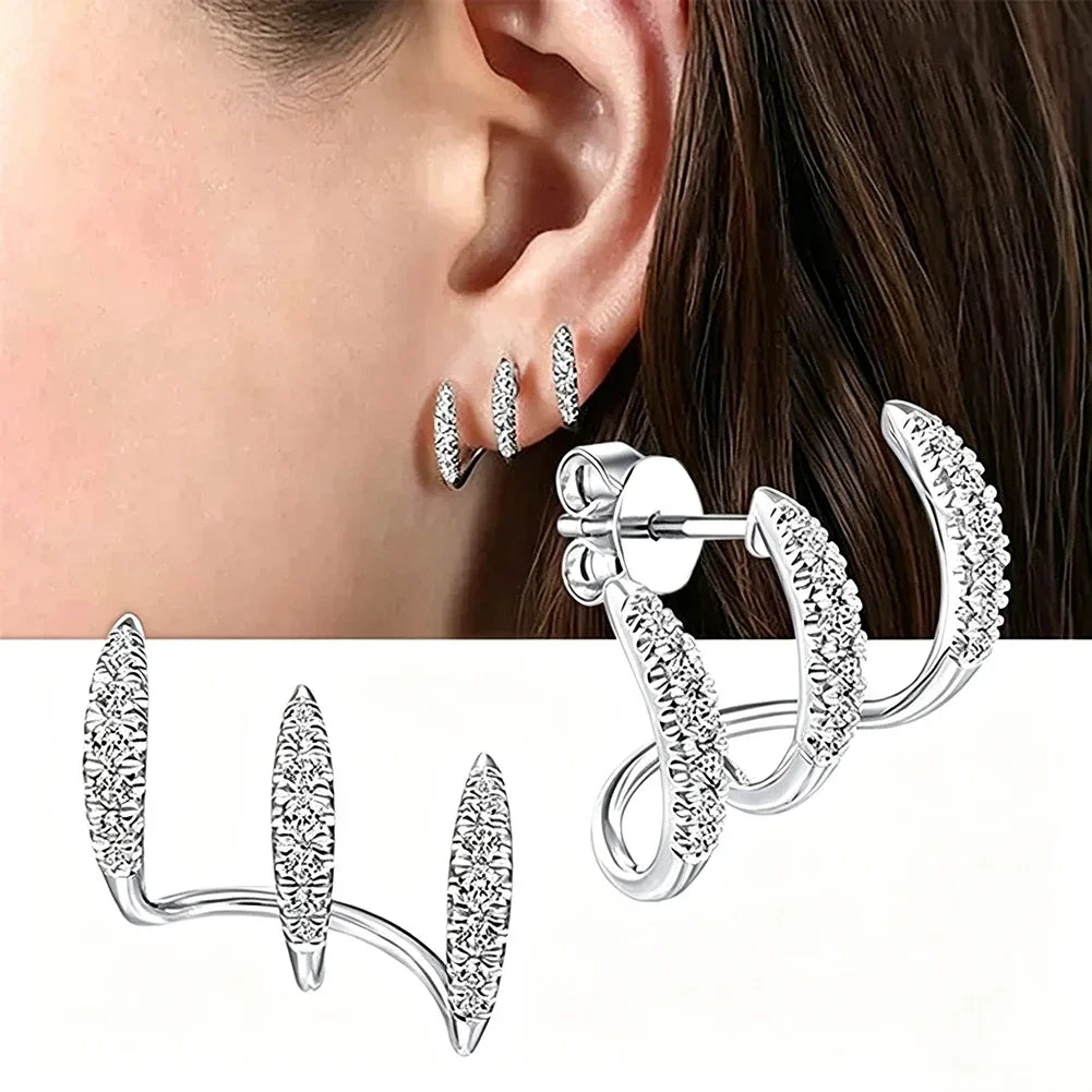 Elegant earrings with three-prong rhinestones