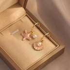 Shell and pink pearl enamel earrings
